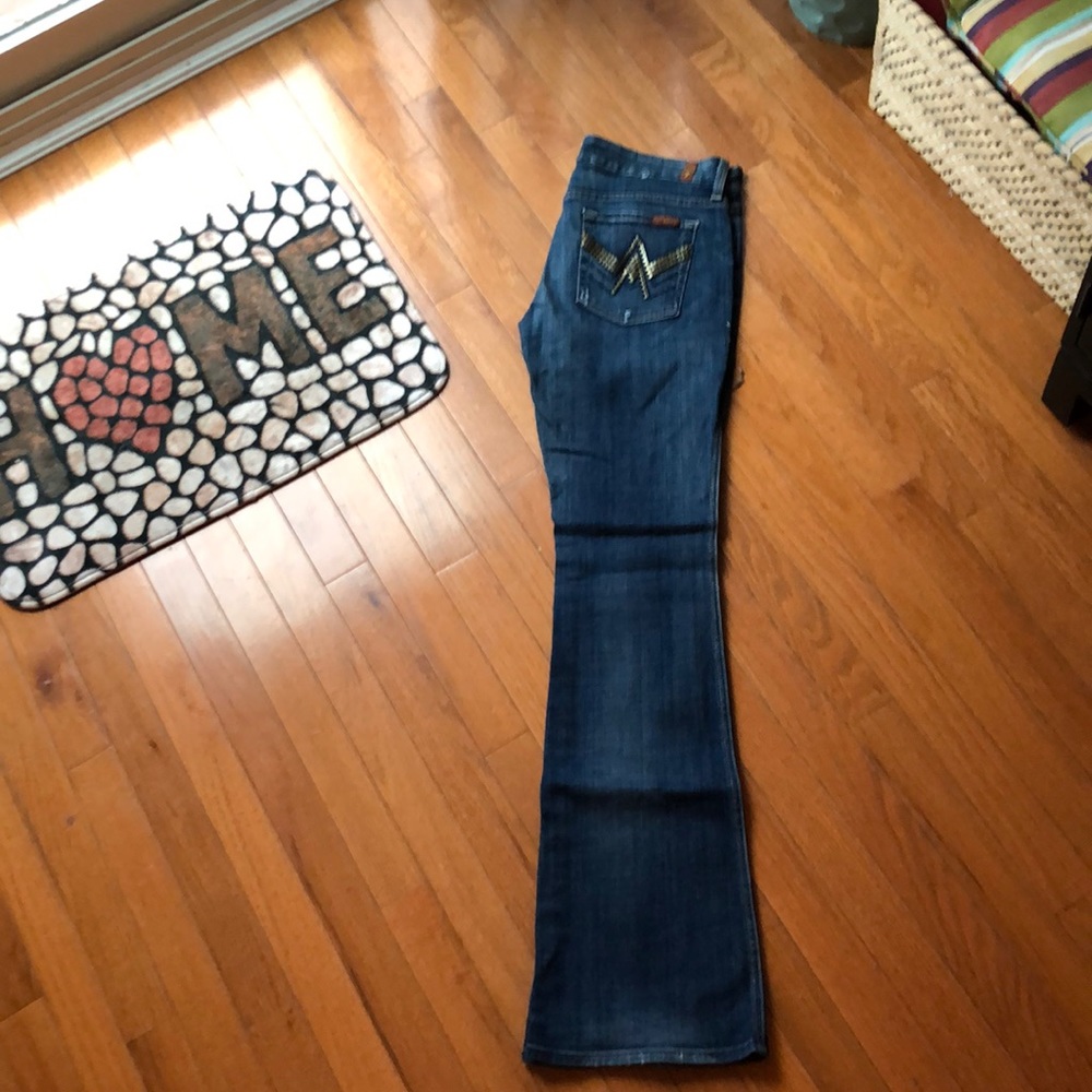 7 Brand jeans with decorative pockets.